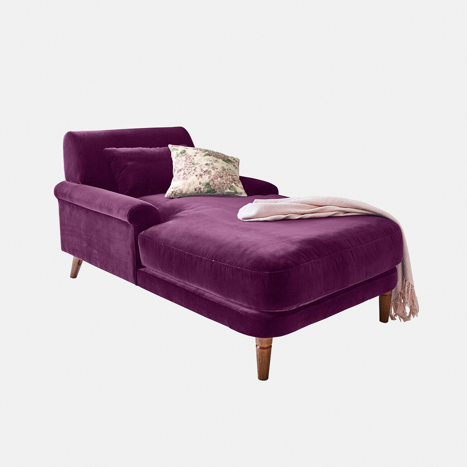 Paarse fluwelen chaise longue met kussen en roze deken, modern loungemeubel