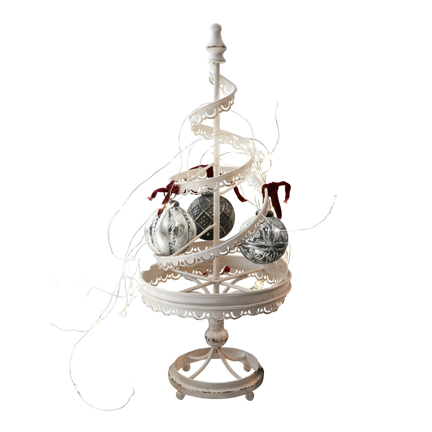 Witte metalen decoratiestandaard met versierde ballen en LED-lichtsnoer voor feestelijke binnenhuisdecoratie