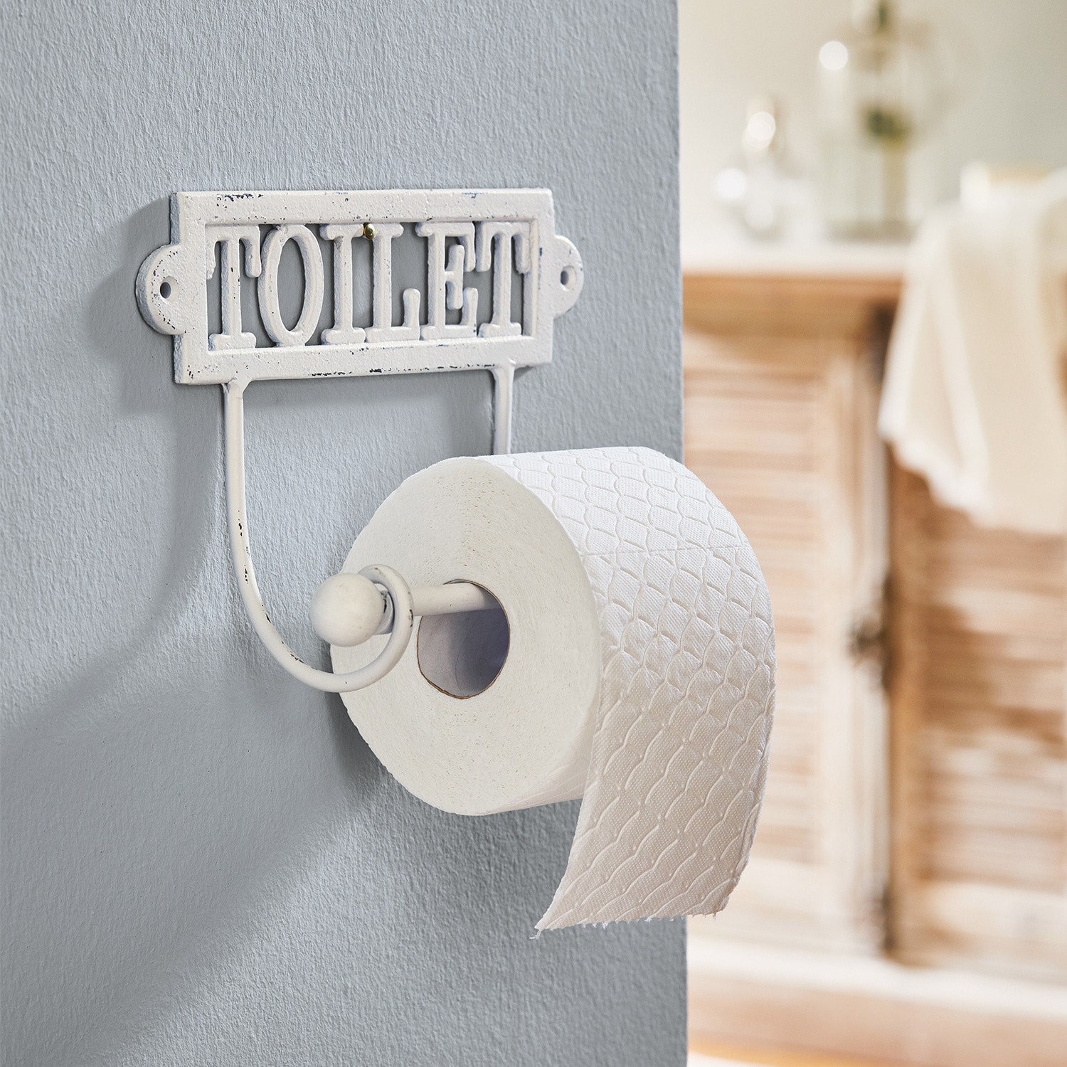 Toiletrolhouder Miramas Witte metalen toiletrolhouder met tekst TOILET in vintage stijl voor badkamer