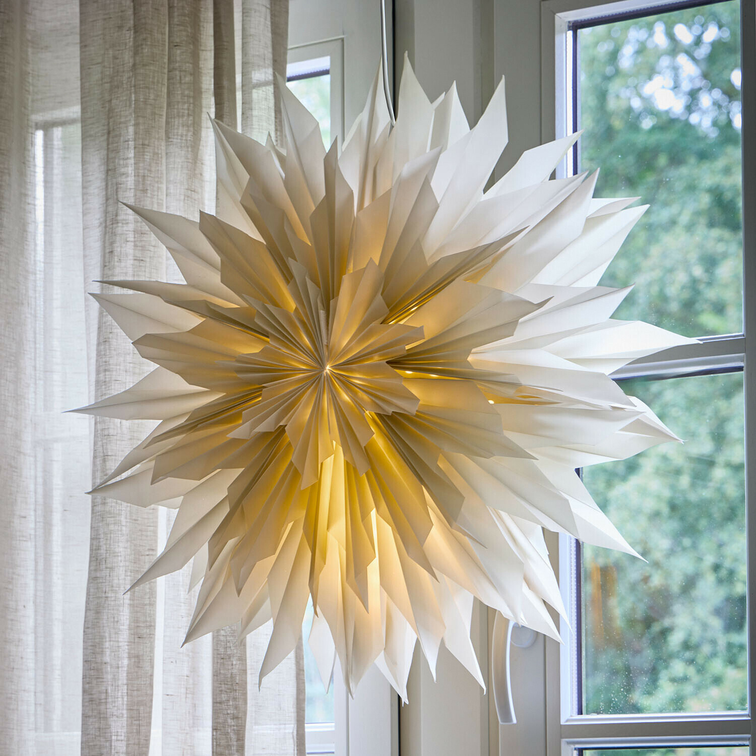 Papieren ster met verlichting Tindrae