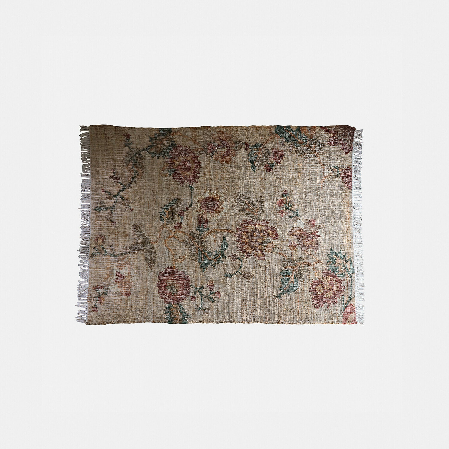 Vloerkleed Caléndoro Beige vloerkleed van natuurlijk materiaal met bloemenpatroon en franjes aan de zijkanten voor interieur