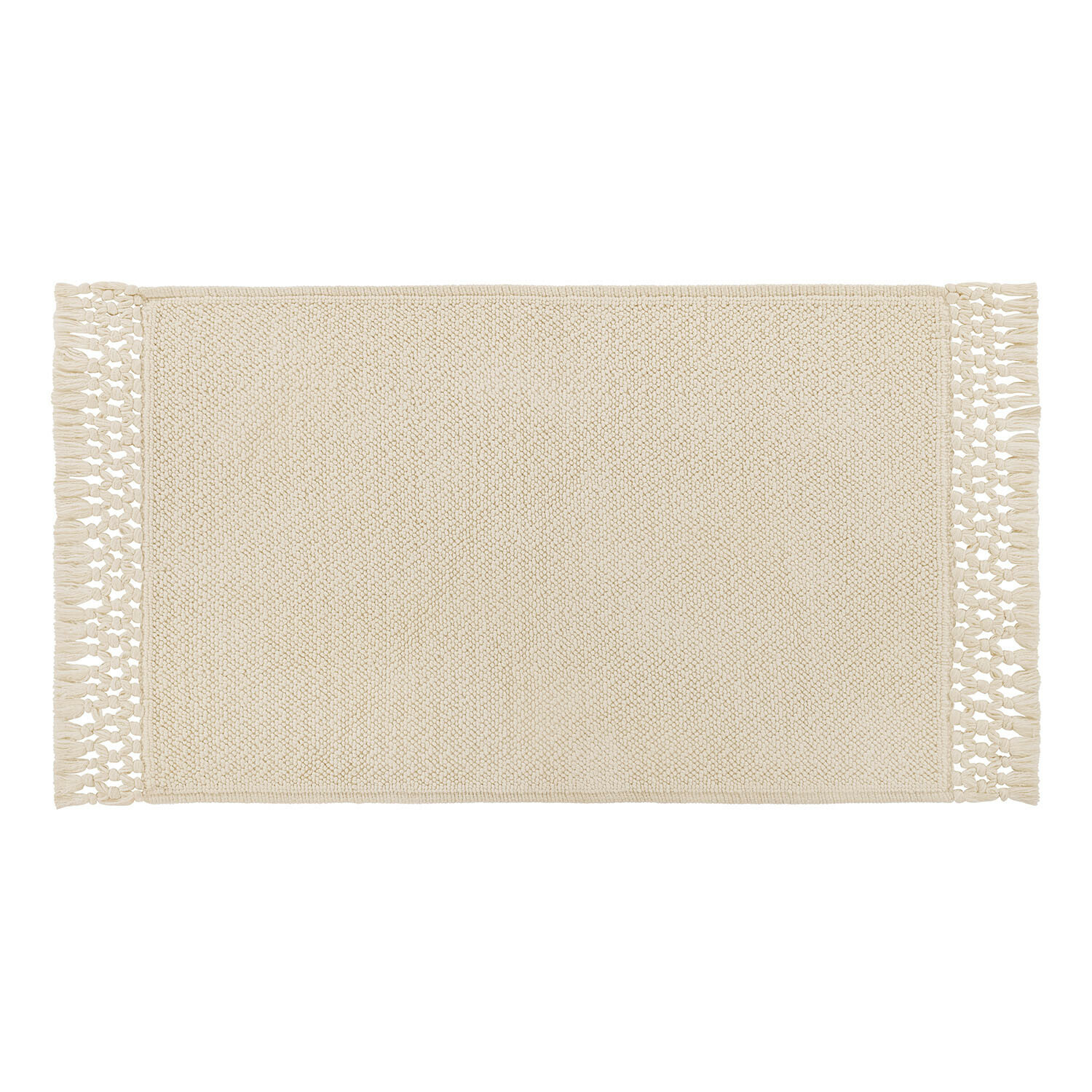 Crèmekleurige badmat Faelwyn van zacht materiaal met decoratieve franjes, ideaal voor de badkamer