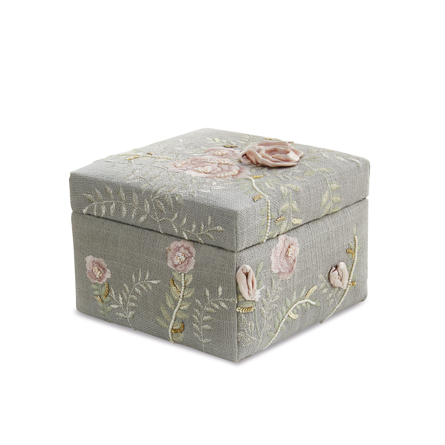 Grijze stoffen doos met roze geborduurde bloemen en decoratieve deksel
