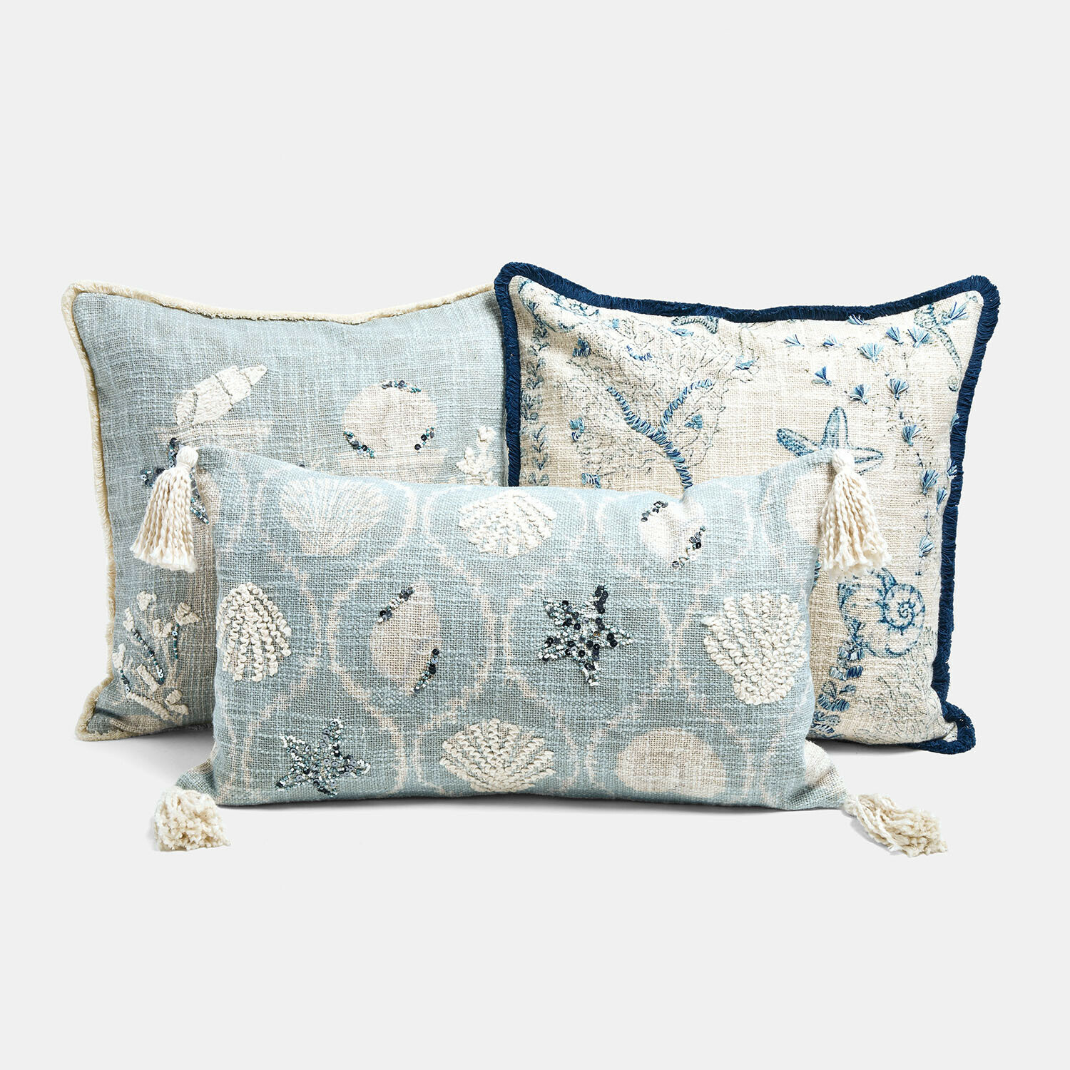 Kussenhoes set van 3 Calerand Set van drie decoratieve kussens met schelpen- en zeestervormen in blauw- en crèmekleuren