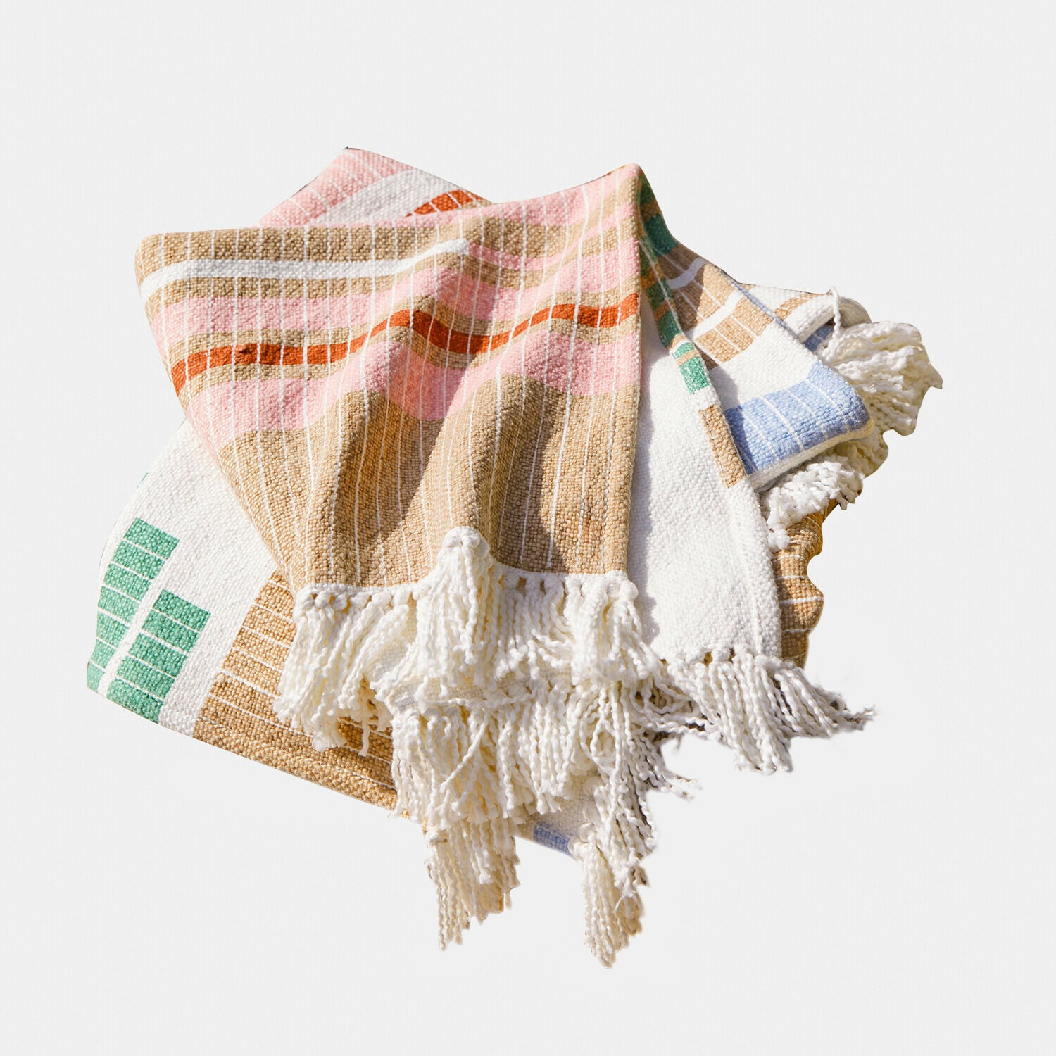 Kleurrijk katoenen deken met franjes in pasteltinten, zacht en decoratief huistextiel