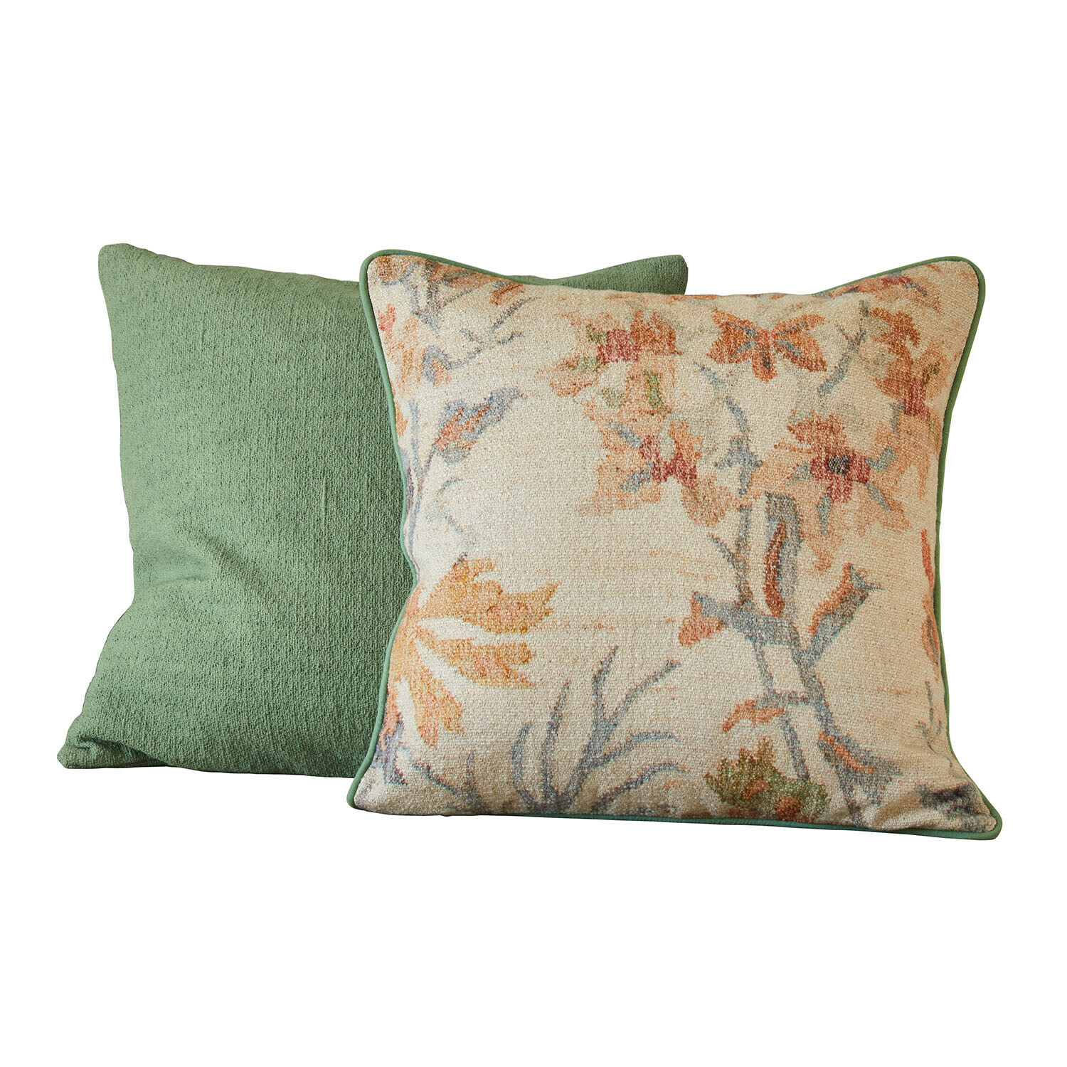 Set van twee sierkussens, één groen en één met bloemenpatroon op crèmekleurige achtergrond