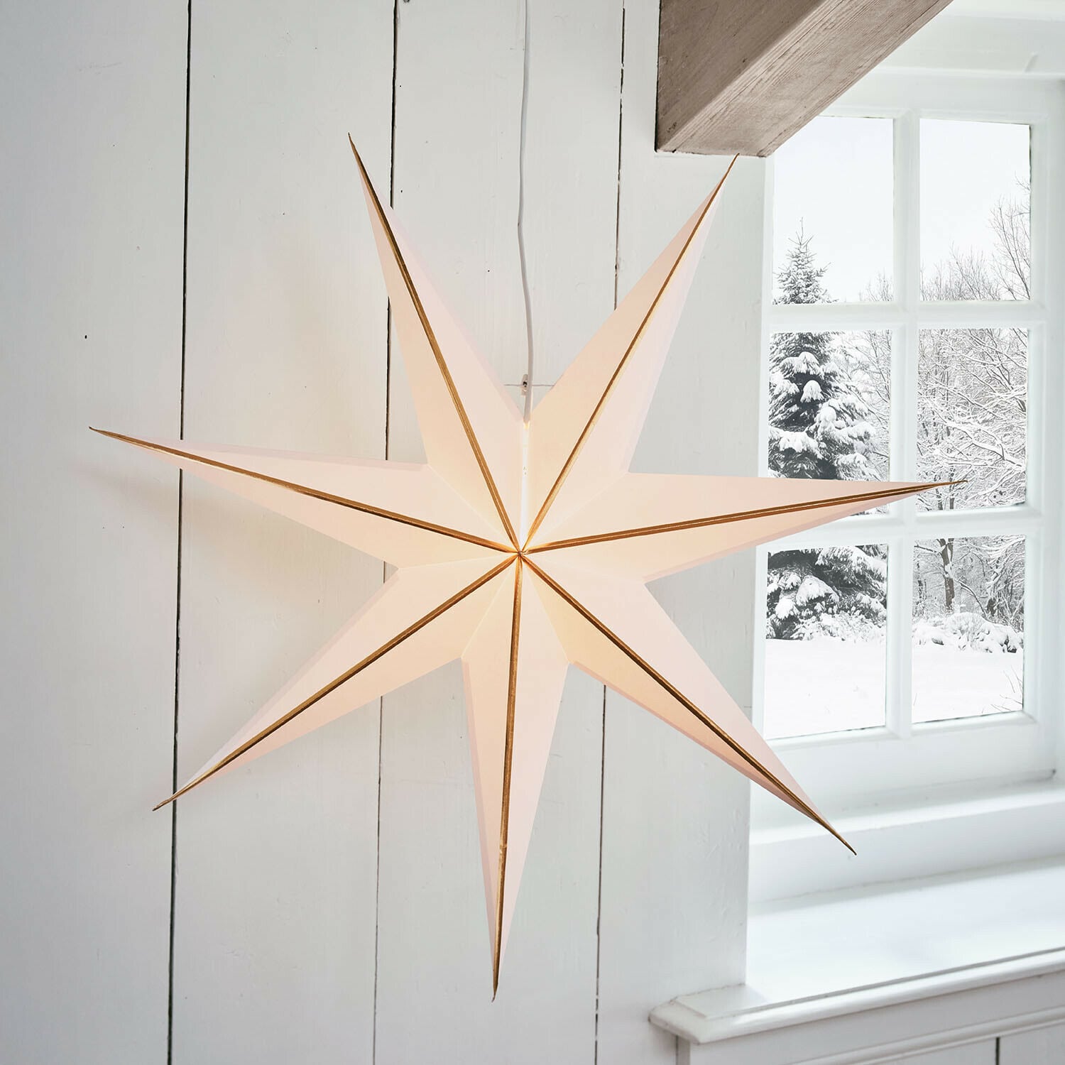 Papieren ster met verlichting Stardomen