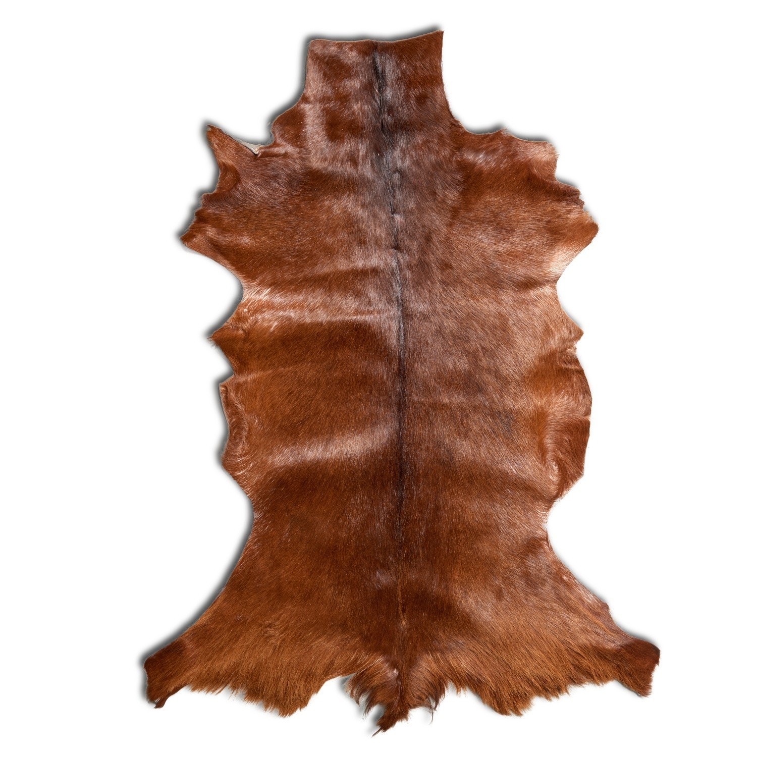 Bruine geitenharen vloerkleed van natuurlijk materiaal, zacht en decoratief voor binnen.