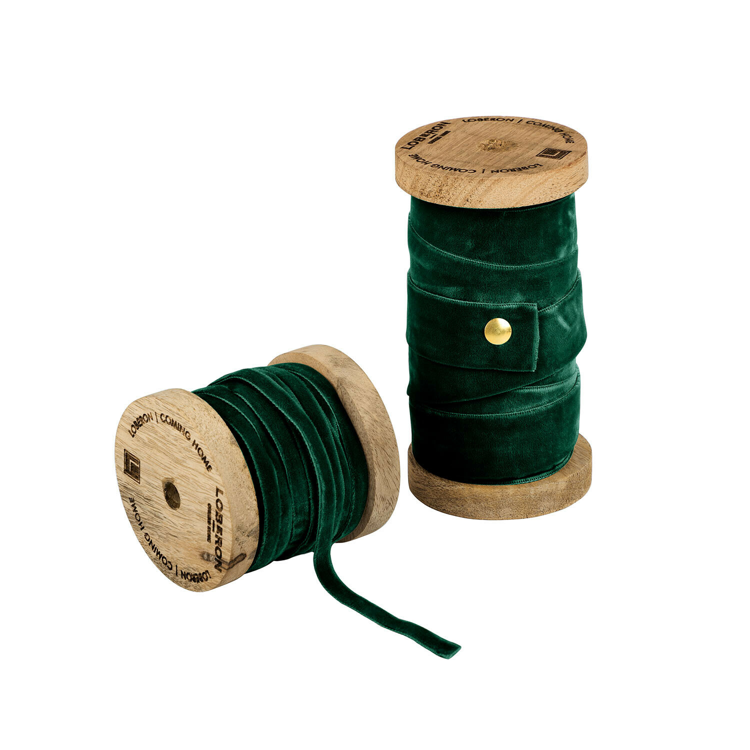 Set van twee donkergroene fluwelen linten op houten spoelen voor decoratie en knutselen