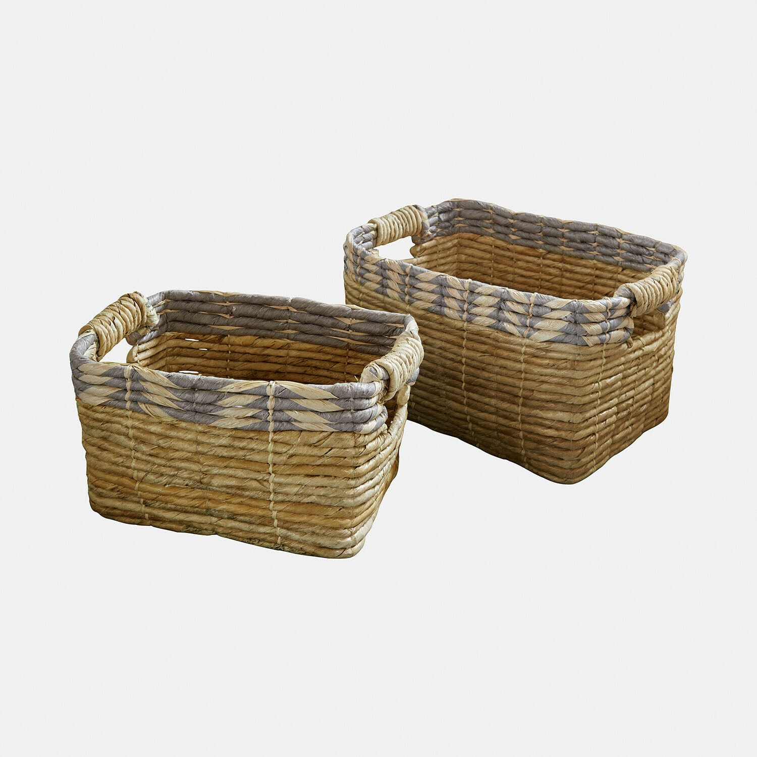 Set van twee rechthoekige manden van gevlochten riet in natuurlijke en grijze tinten voor opbergen