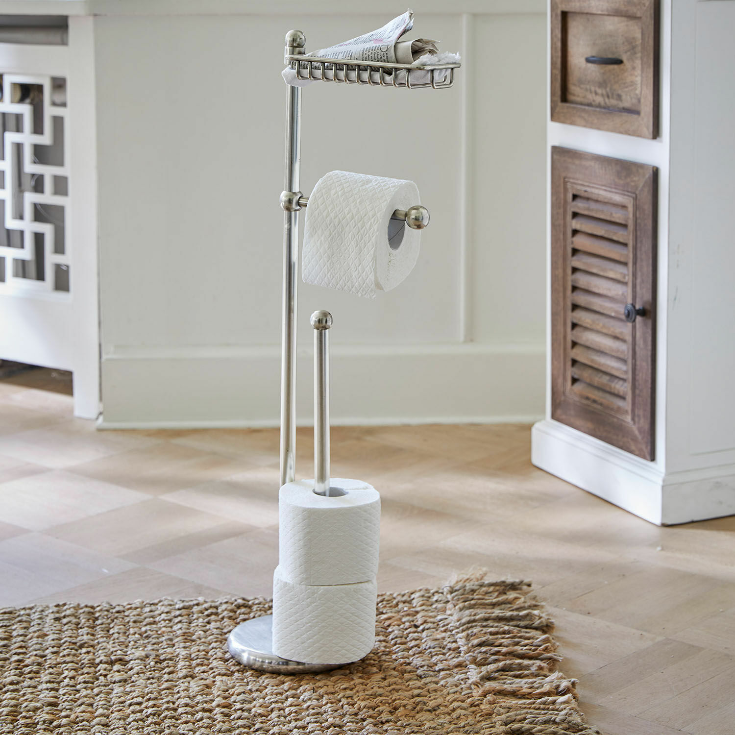 RVS toiletrolhouder met plankje voor kranten en ruimte voor extra rollen