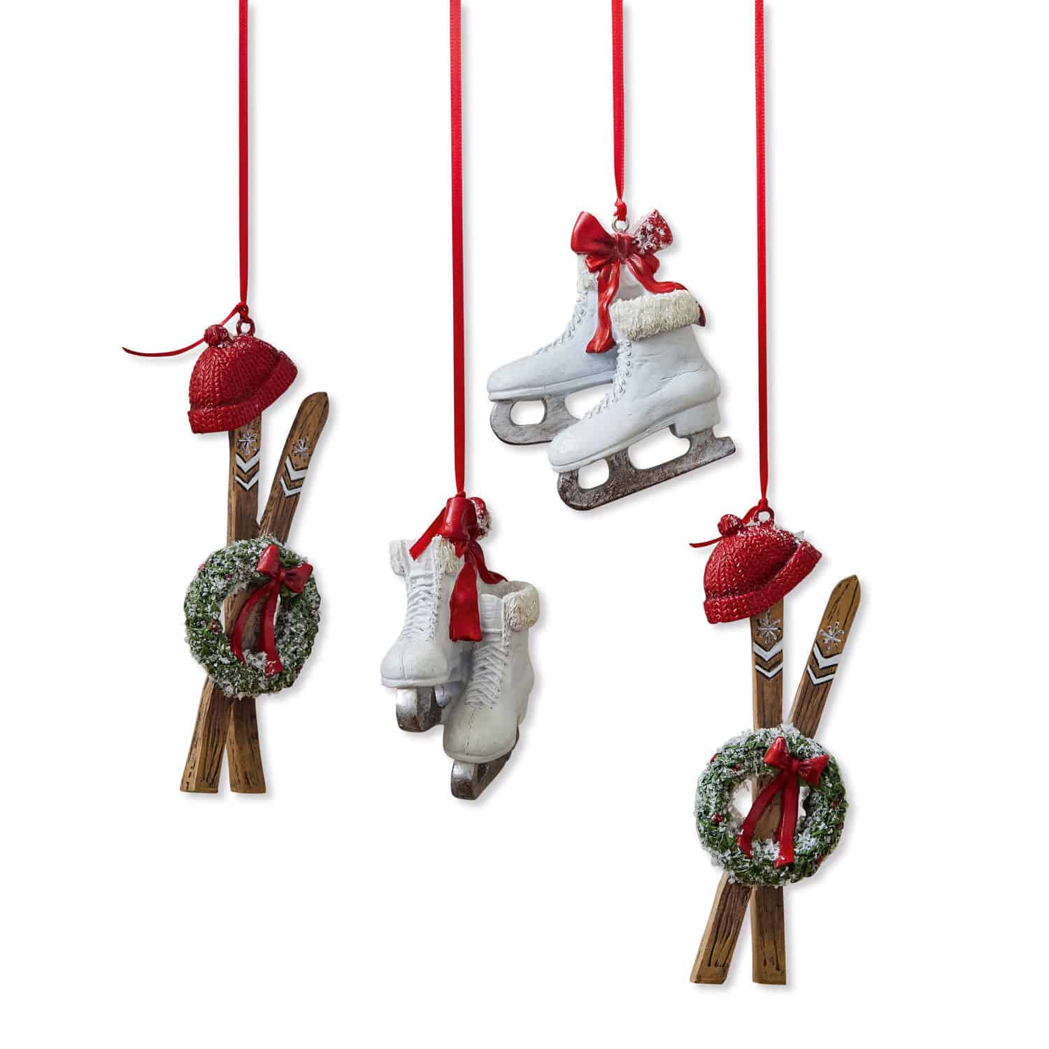 Set van 4 kleurrijke kerstversieringen met schaatsen, ski's, kransen en rode strikken