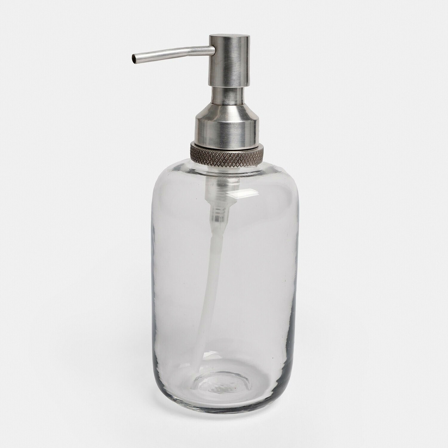 Transparante glazen dispenser met zilveren metalen pomp voor zeep of vloeistof