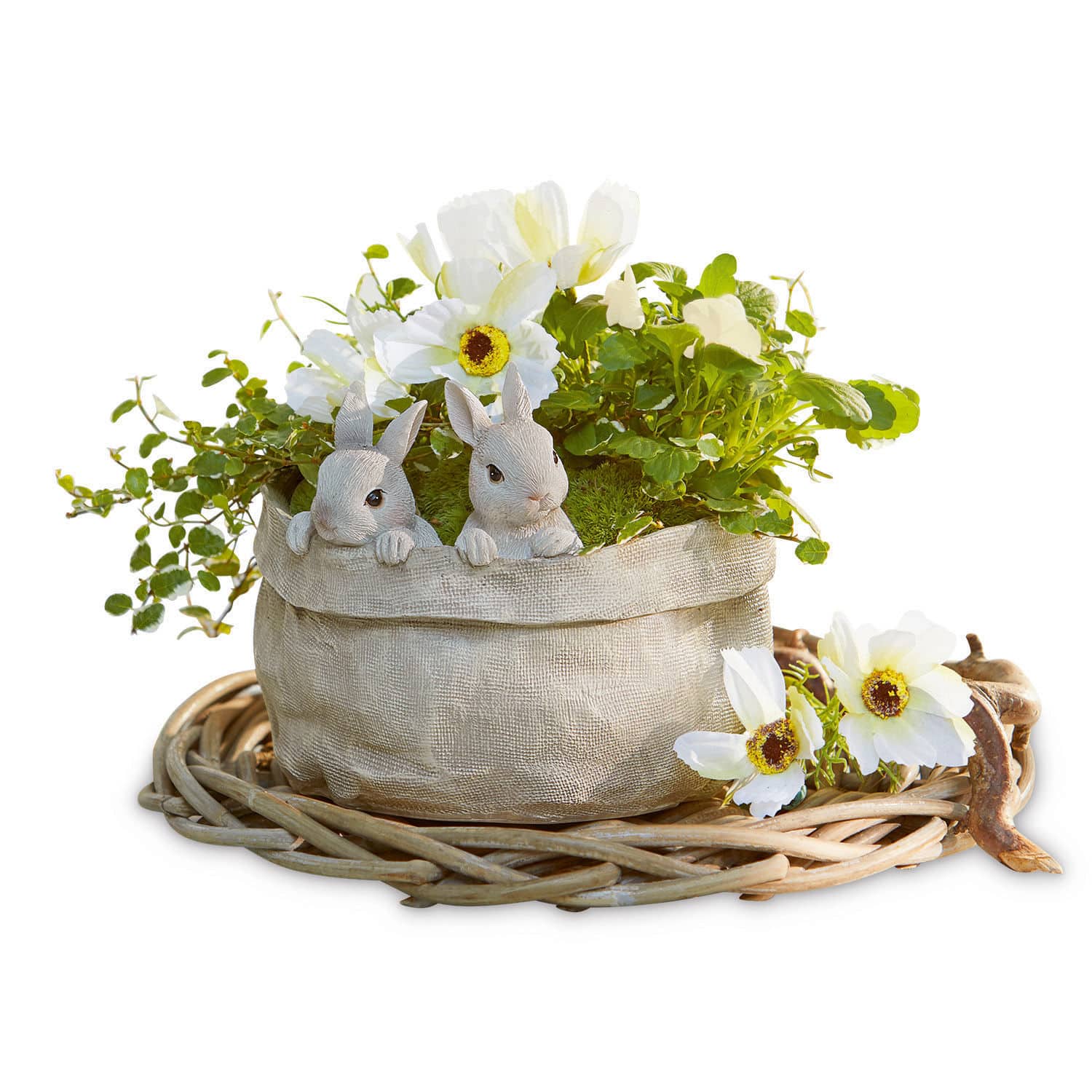 Bloempot Mouriel Decoratieve stoffen pot met witte bloemen en konijnenfiguren op een rieten onderzetter