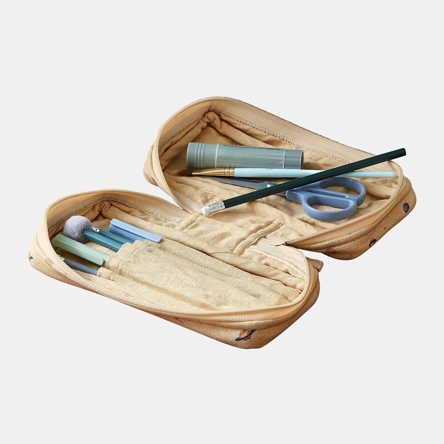 Beige stoffen etui met schrijf- en tekengerei, praktische schoolorganizer