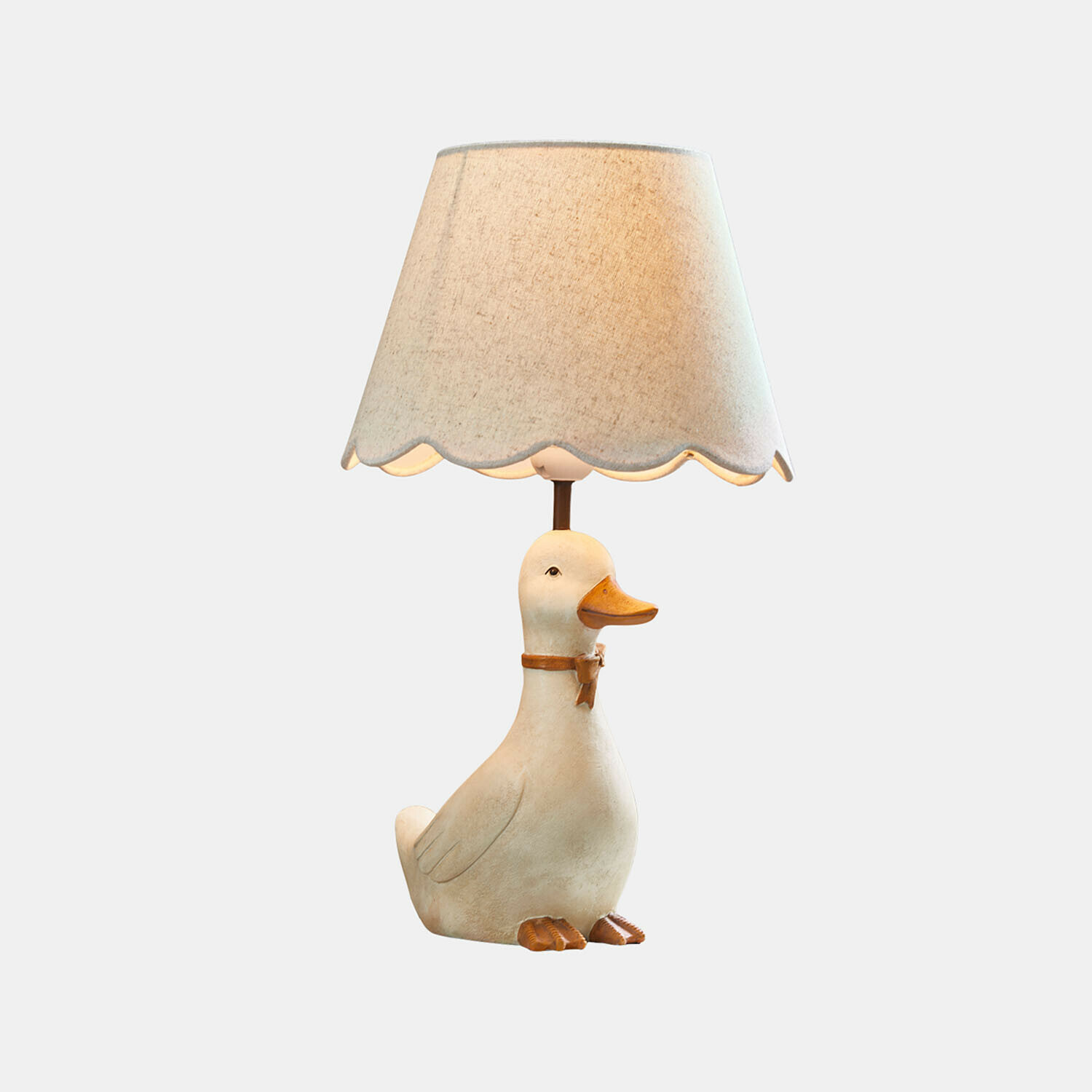Nachtlampje Tillyboo Tafellamp met beige kap en voet in de vorm van een witte eend met oranje snavel