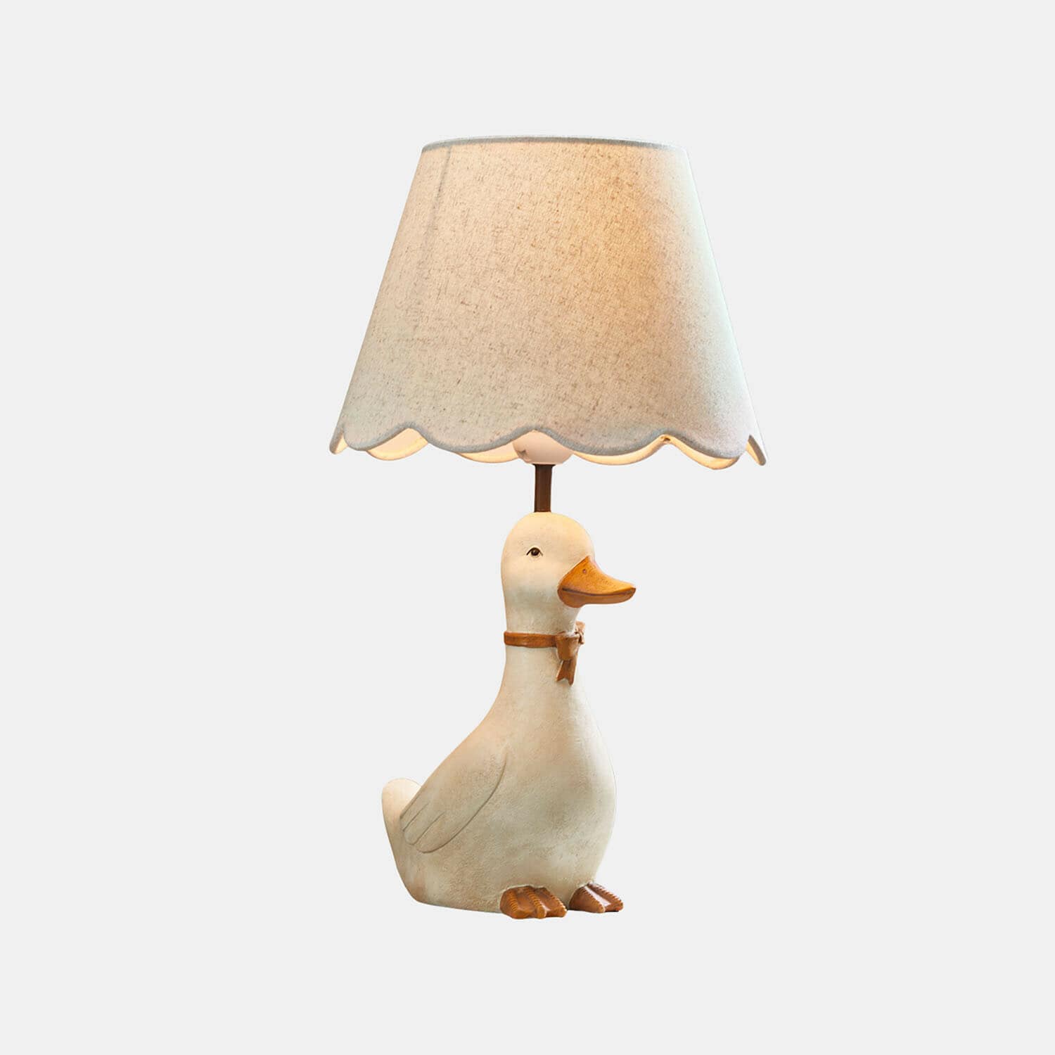 Nachtlampje Tillyboo Tafellamp met beige kap en voet in de vorm van een witte eend met oranje snavel