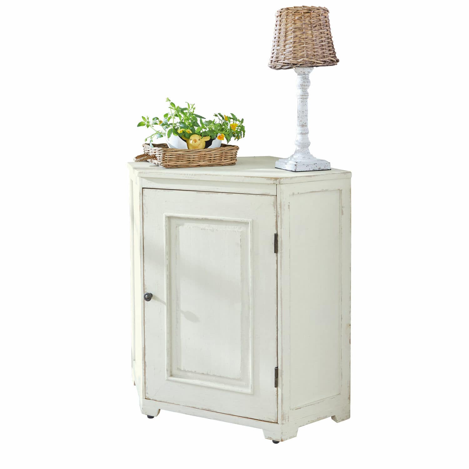 Hoekkast Yurielka Witte houten kast met één deur, daarop lamp met rieten kap en mand met planten
