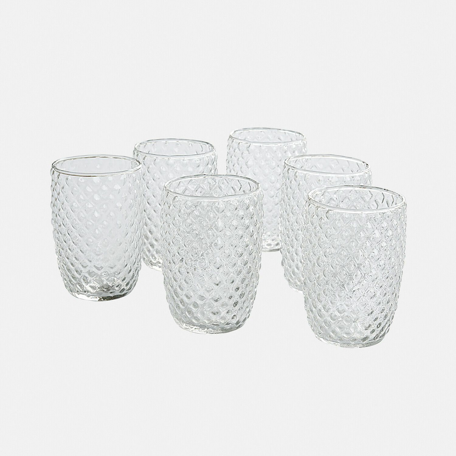 Glas set van 6 Ivorias Set van zes transparante glazen van gestructureerd glas met diamantpatroon voor dranken