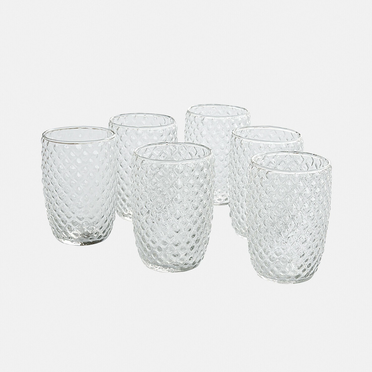 Glas set van 6 Ivorias Set van zes transparante glazen van gestructureerd glas met diamantpatroon voor dranken