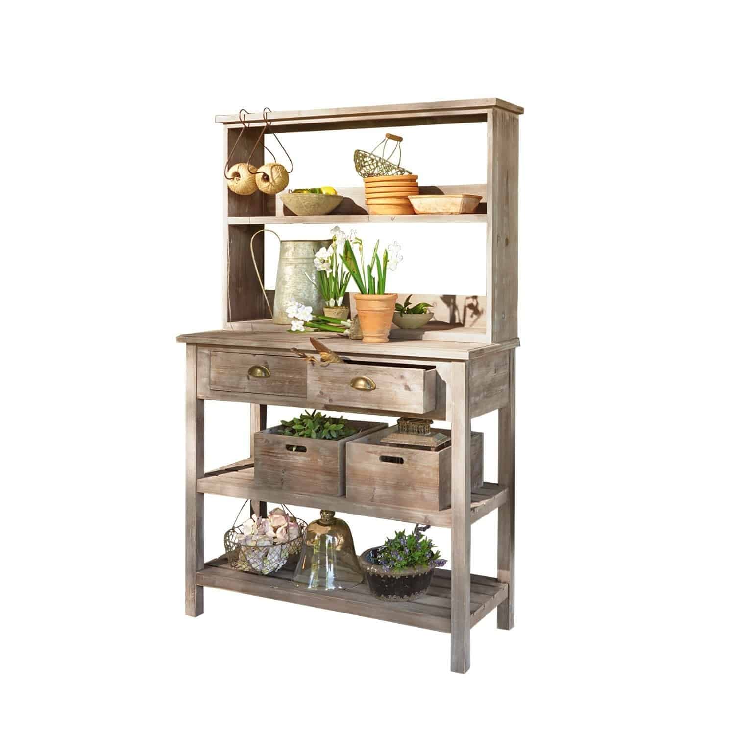 Plantentafel Landover Houten tuinkast met planken en lades, versierd met bloempotten en tuingereedschap