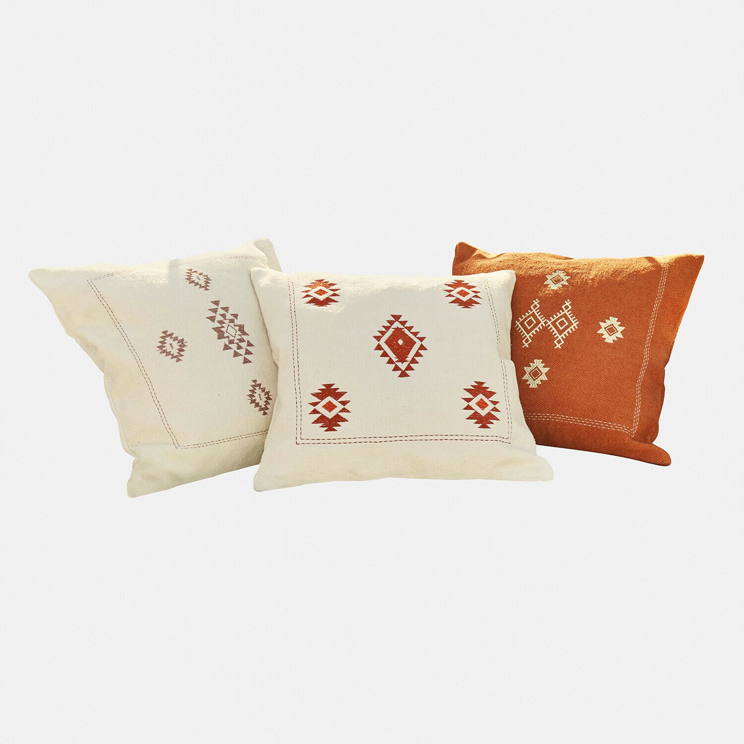 Set van drie decoratieve katoenen kussens in crème en oranje met geometrisch patroon voor woonkamer