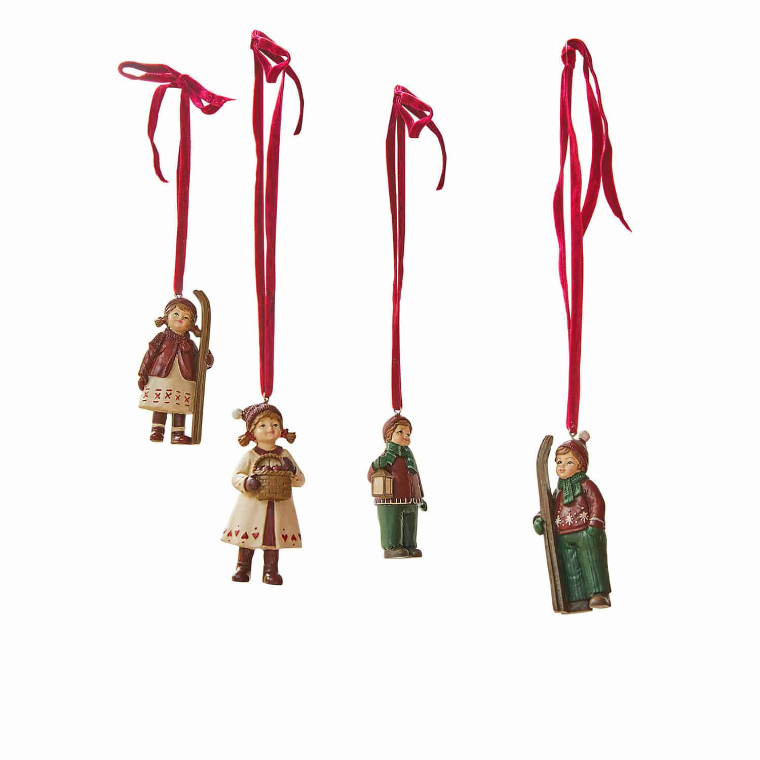 Hanger set van 4 Helgelund Set van vier kerstversieringen met kinderfiguren in winterkleding aan rode linten om op te hangen