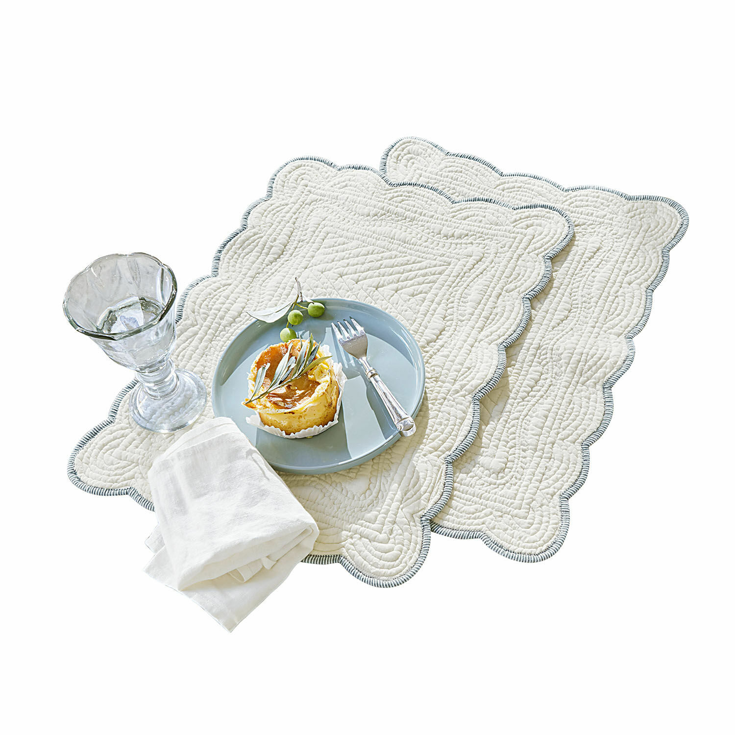 Placemat set van 2 Fontienne Set van twee crèmekleurige katoenen placemats met decoratieve quilting en grijze rand