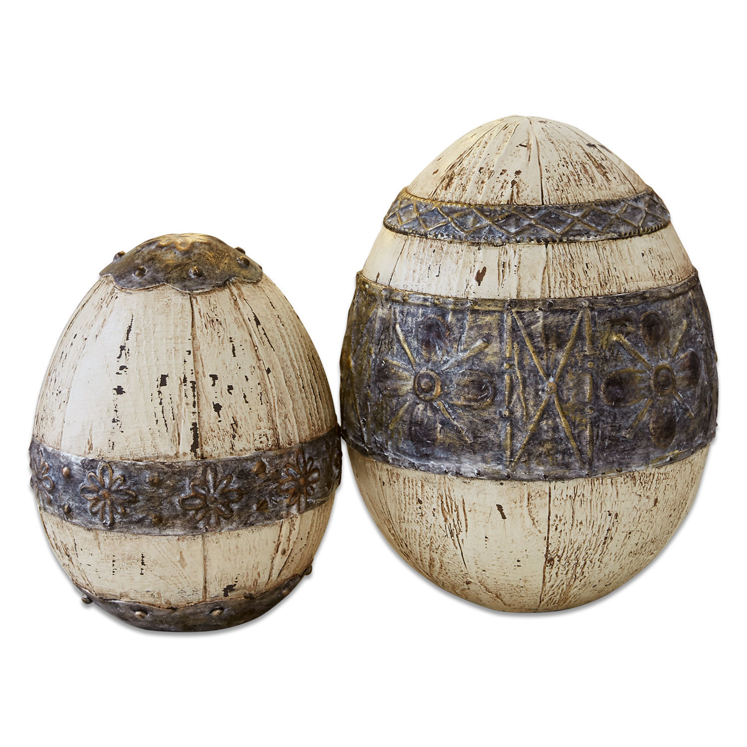 Decoratieve eieren van hout en metaal in crèmekleur met rustiek patroon voor interieur