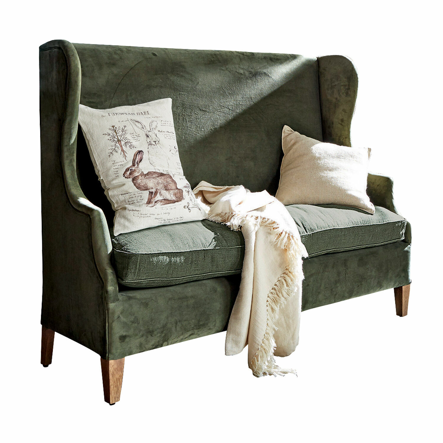 antiekgroen Sofa Ombra in antiekgroen fluweel met kussens en crème deken voor woonkamer