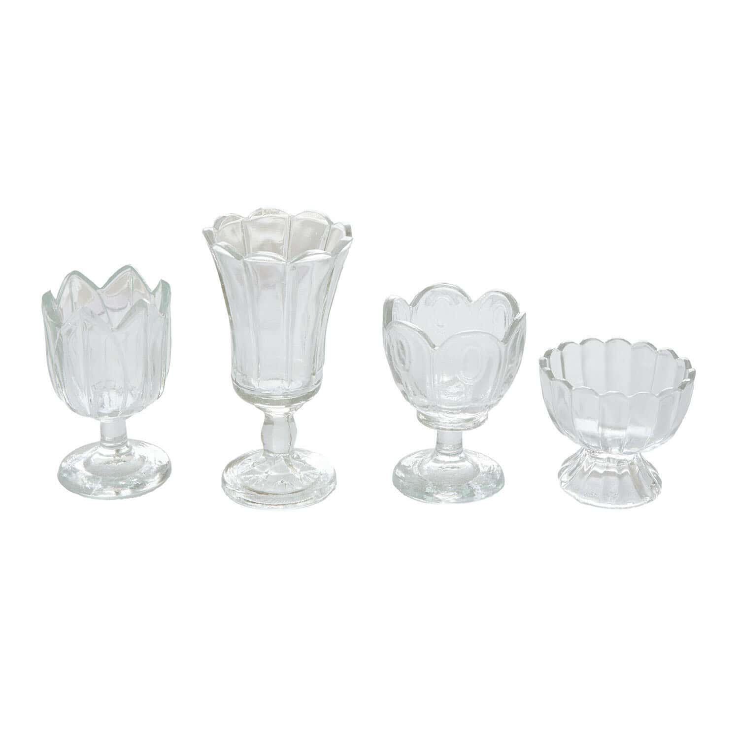 Windlichtje set van 4 Amisette Set van vier transparante glazen kandelaars in verschillende vormen en decoratieve patronen