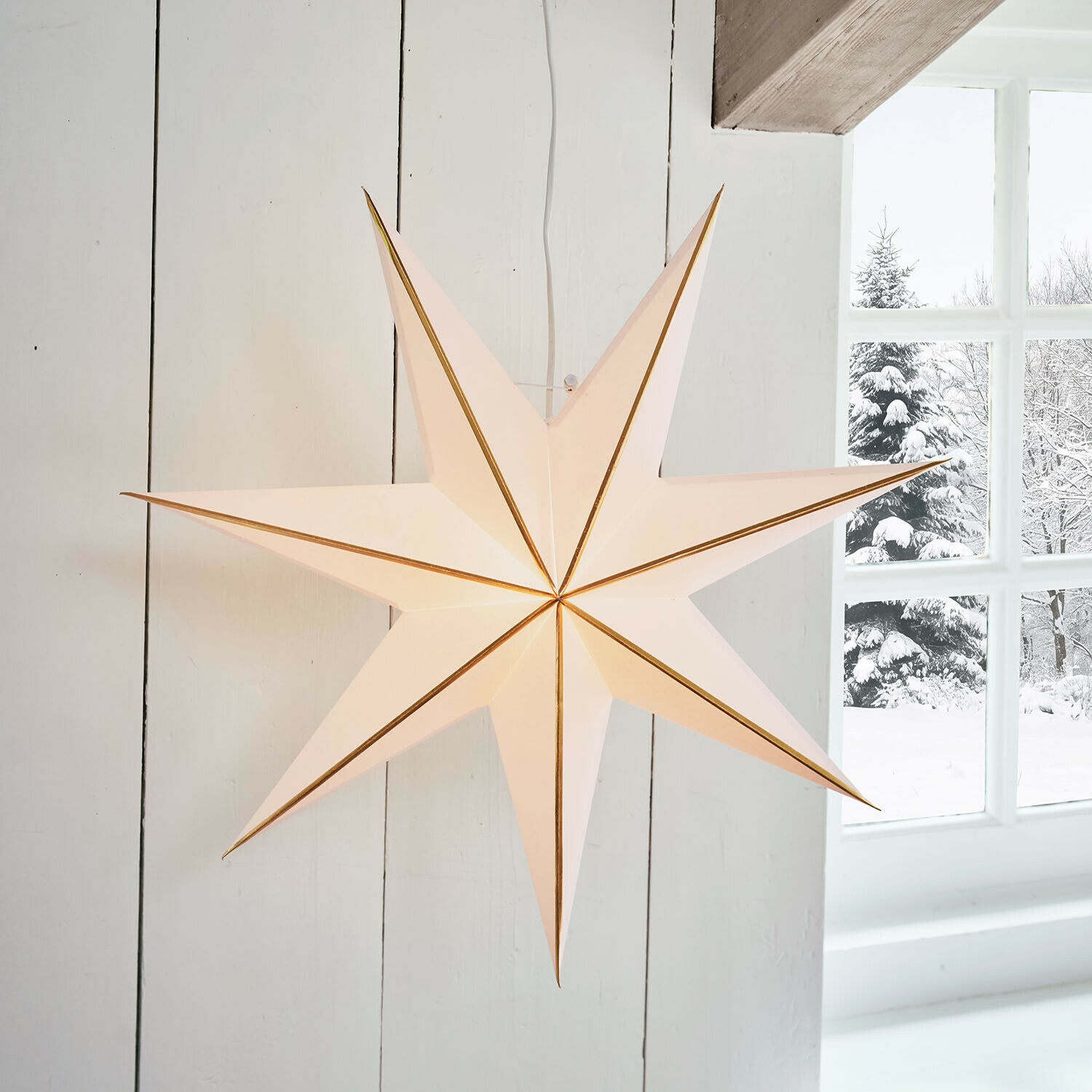 Papieren ster met verlichting Stardomen