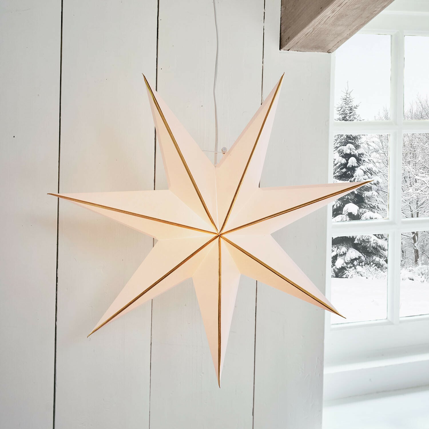 Papieren ster met verlichting Stardomen