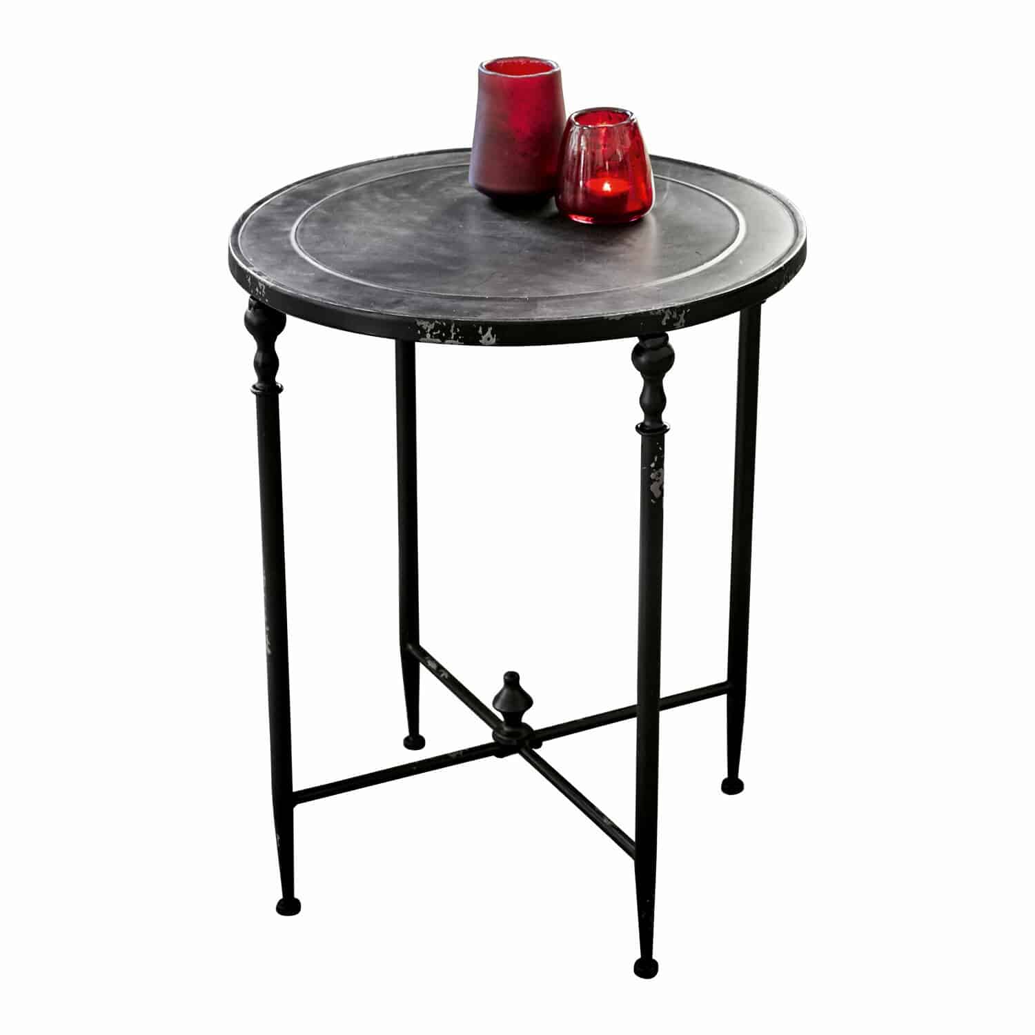 Bijzettafel Danbury Ronde zwarte metalen bijzettafel met decoratieve poten en rode kaarsenhouders erop