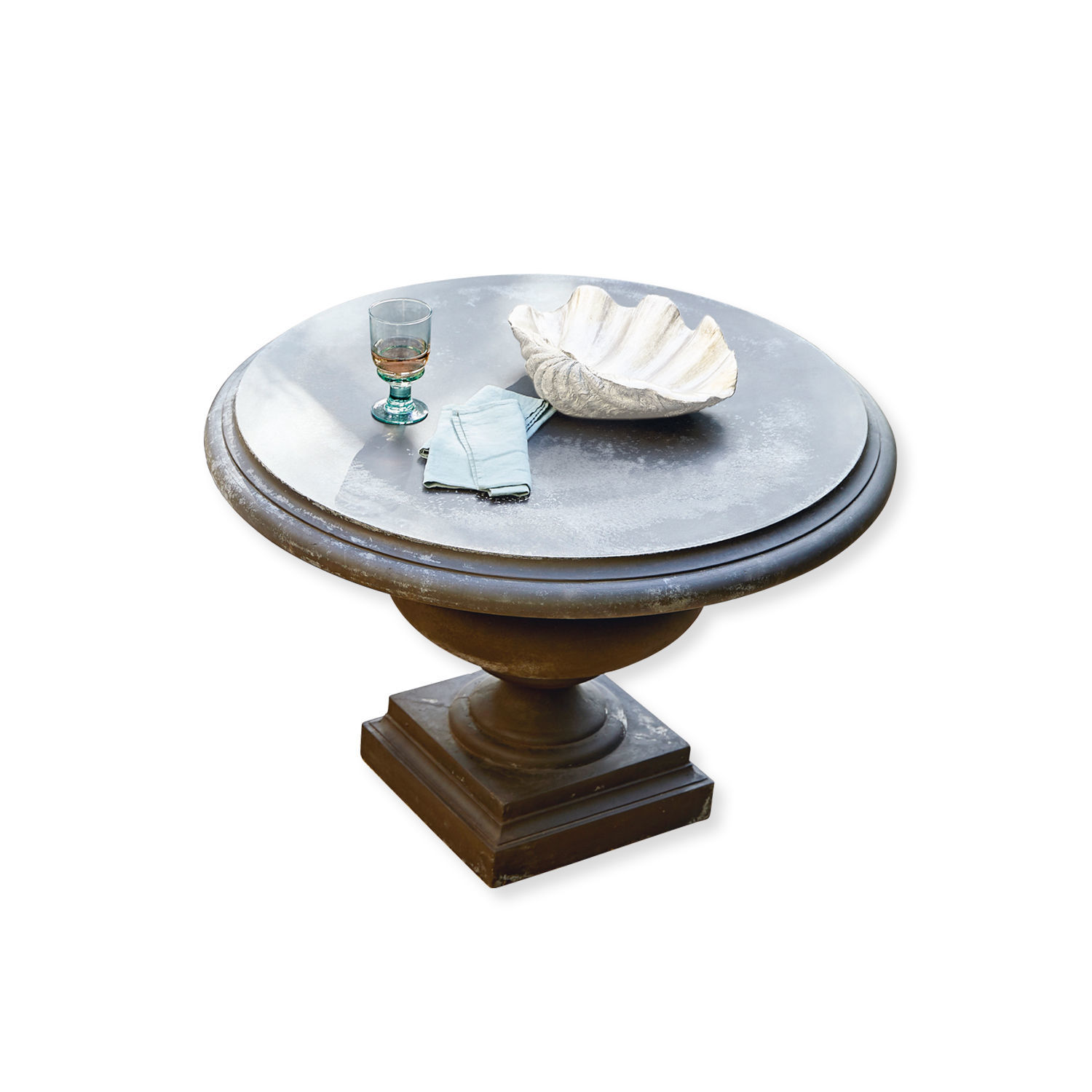 Tafel Monterey Ronde tafel met metalen blad en donkere voet, versierd met glas en witte schelp