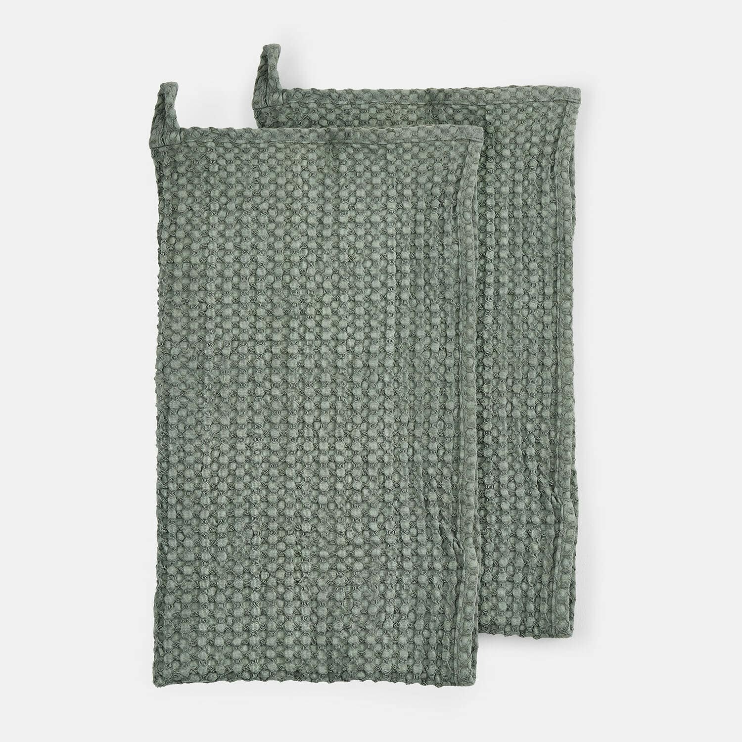 Set van twee groene katoenen pannenlappen met wafelstructuur voor handbescherming in de keuken